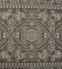 Machine washable rug in deep tones with ornate motifs.