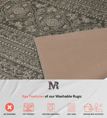 Bold and elegant dark ornate washable rug.