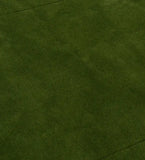 Luxury solid wool rug in deep green for contemporary interiors