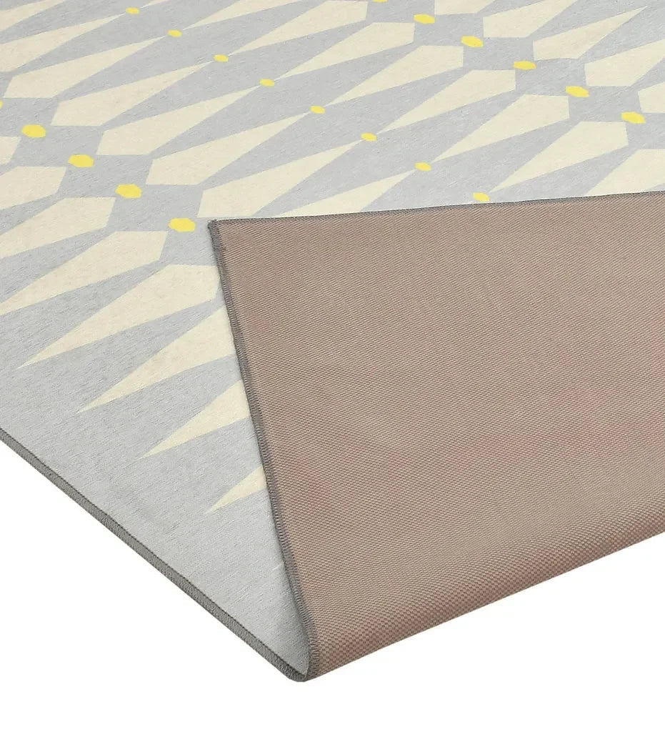 Soft and durable geometric diamond pattern rug.