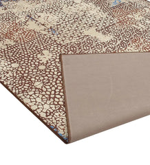 Durable mosaic patterned rug for bohemian and transitional spaces.