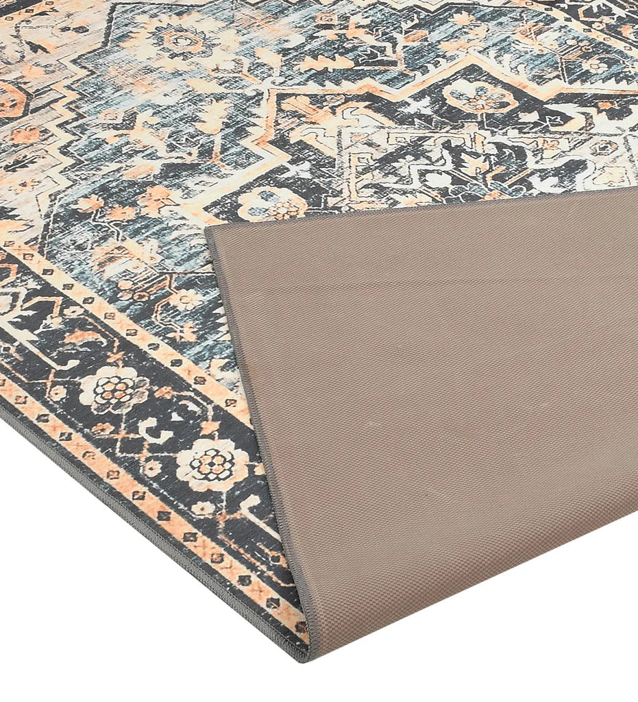 Durable vintage-style rug for rustic and bohemian spaces.
