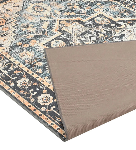 Durable vintage-style rug for rustic and bohemian spaces.