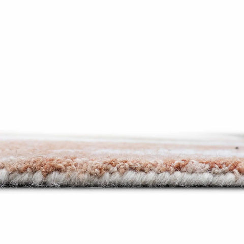 Rust brown and grey hand-tufted rug with boho style.