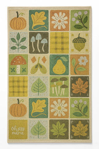 Machine washable fall rug with pumpkins, acorns, and autumn leaves.