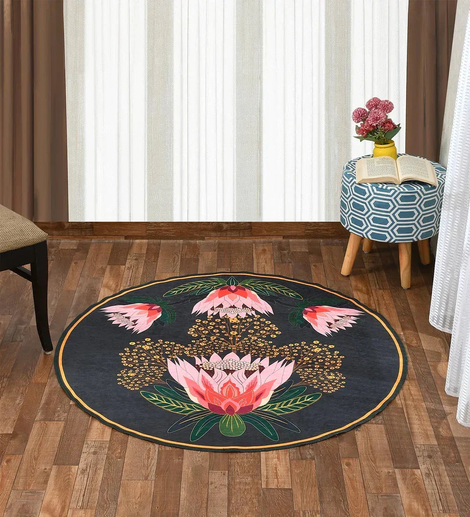 Soft pastel round rug with floral patterns.