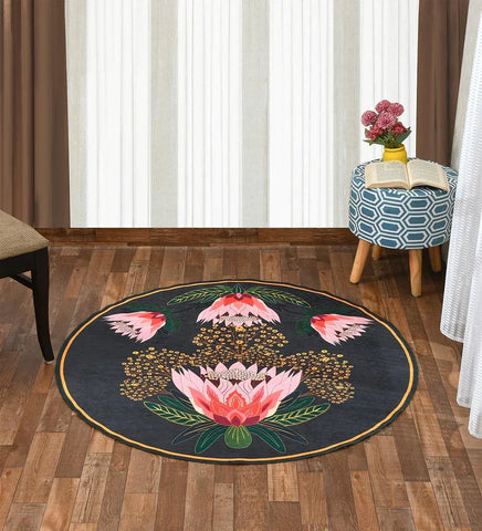 Soft pastel round rug with floral patterns.
