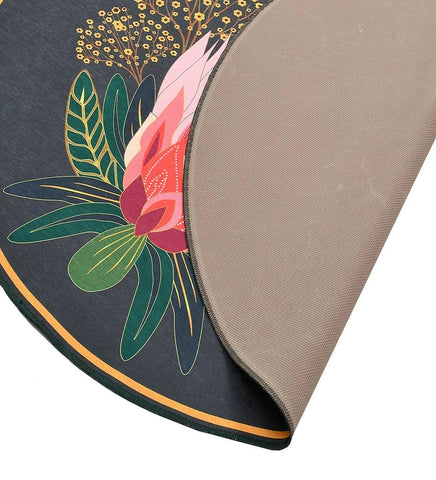 Machine washable round rug with delicate floral design.