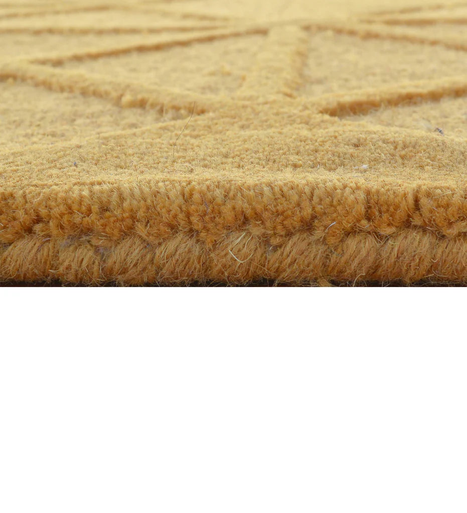 Premium hand-tufted wool rug with gold embossed pattern