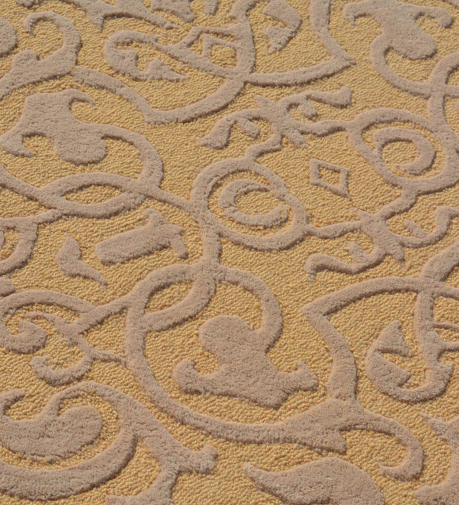 Ornamental embossed wool rug in gold tones for formal interiors