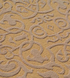Ornamental embossed wool rug in gold tones for formal interiors