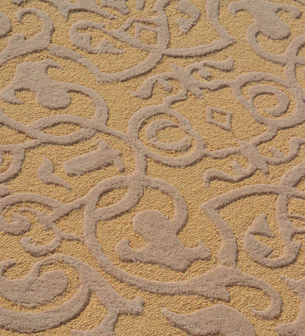 Ornamental embossed wool rug in gold tones for formal interiors
