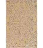 Gold hand-tufted wool rug with embossed damask pattern
