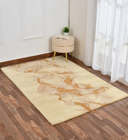 Vibrant abstract wool rug in gold and beige tones.