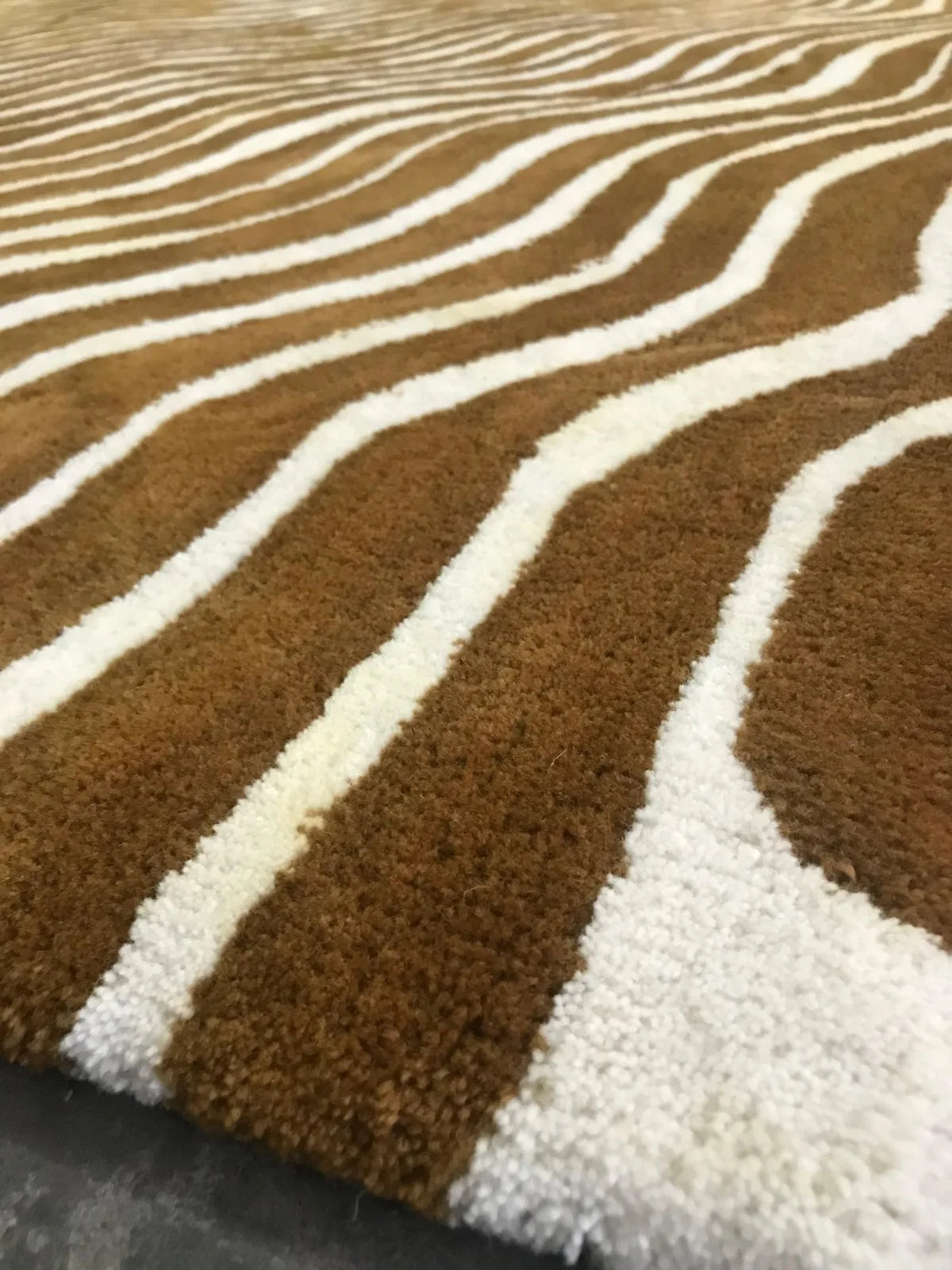 Luxurious gold and cream modern abstract wool rug
