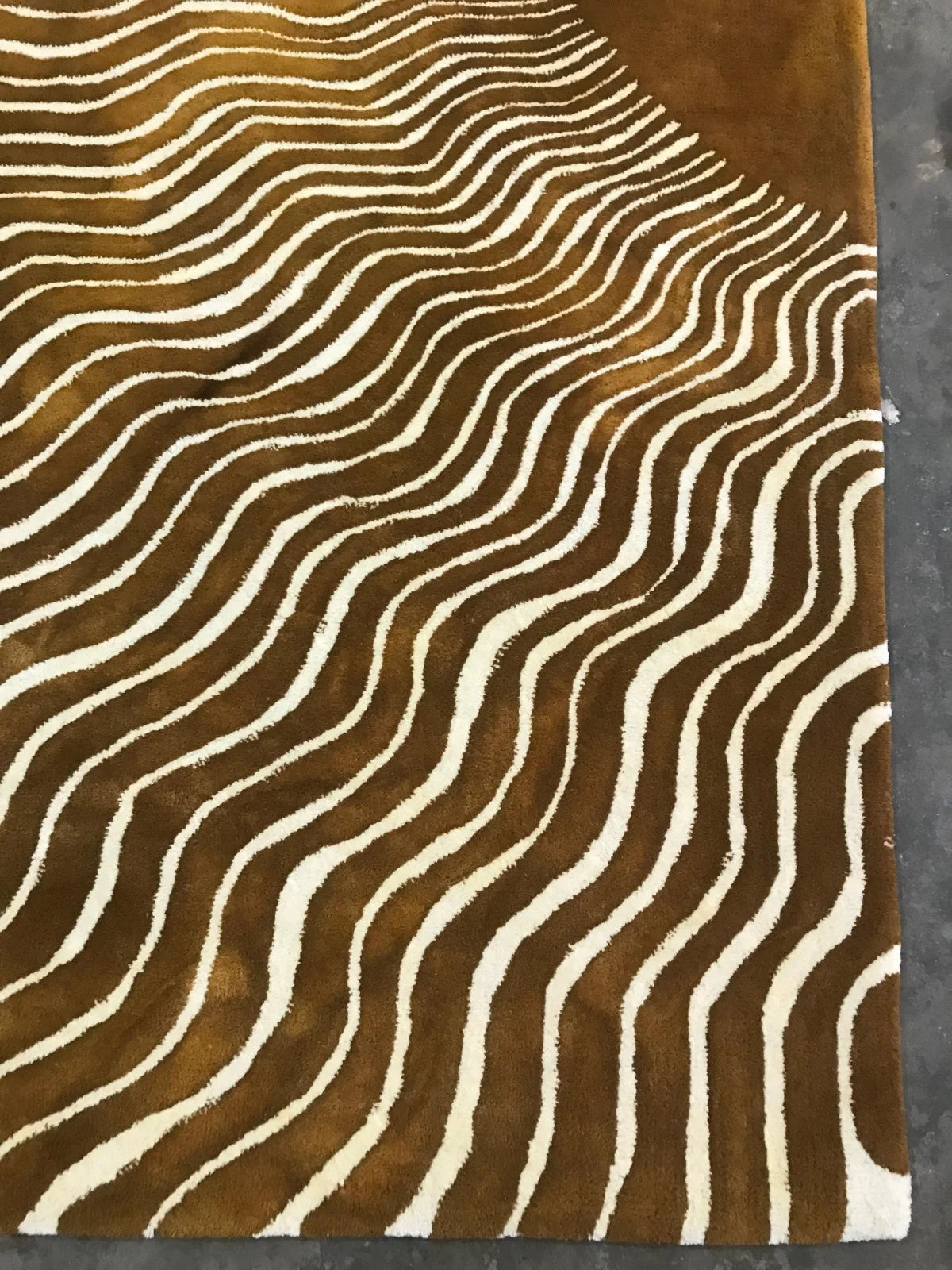 Golden sunburst pattern area rug for modern interiors