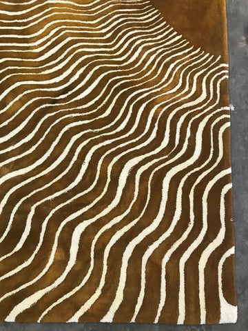 Golden sunburst pattern area rug for modern interiors