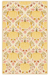 Golden pumpkin floral fall rug with elegant harvest design.