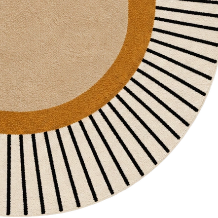 An oval area rug with a modern geometric design, featuring a large beige center, a warm ochre border, and thin black radiating lines on a cream outer edge.