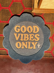 Decorative rug with 'Good Vibes Only' playful rug