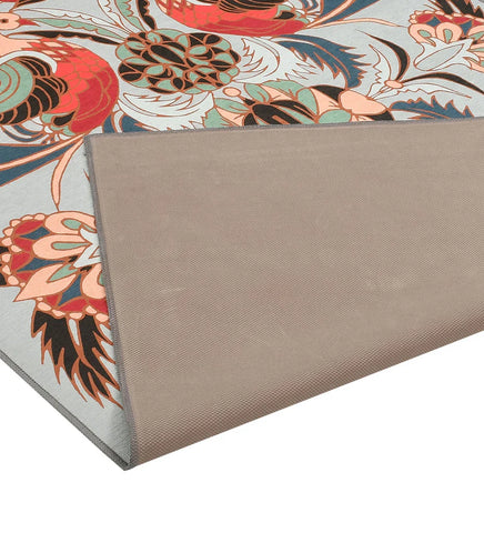 Durable bird and floral patterned rug for cottage-style interiors.