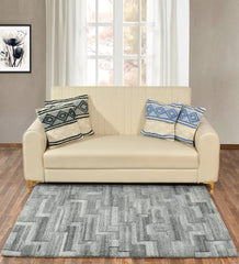 Contemporary grey rug with layered block pattern in silver and charcoal