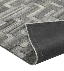 Modern hand-tufted grey rug with architectural geometric design