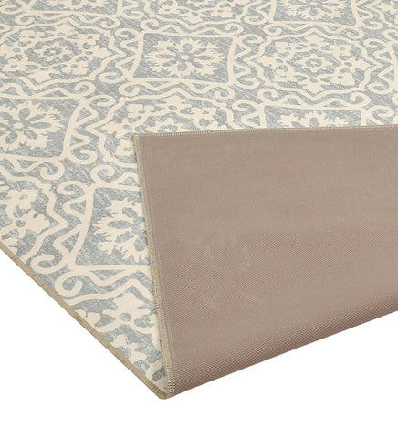 Durable floral and geometric rug in soft neutral tones.