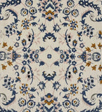 Close-up of luxury handwoven rug with intricate gray and brown medallion floral pattern on beige background