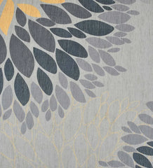 Soft and durable floral rug in gray tones.