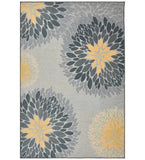 Gray floral modern area rug with large petal patterns in yellow and dark gray