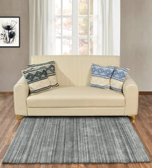 Modern grey rug featuring subtle horizontal stripe texture