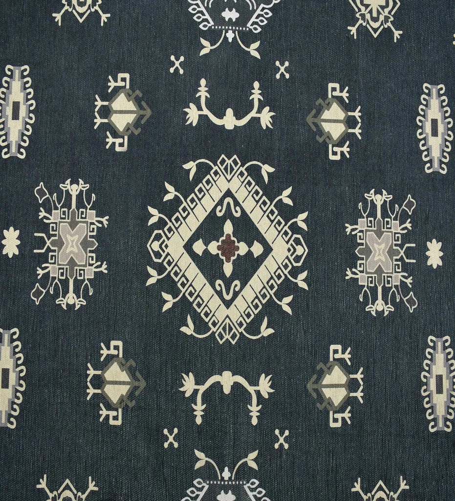Gray and ivory rug with tribal border detail.