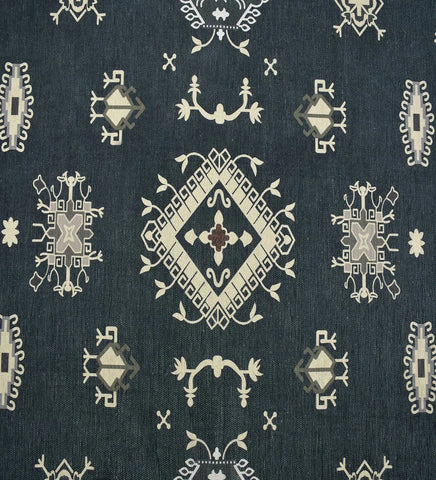 Gray and ivory rug with tribal border detail.