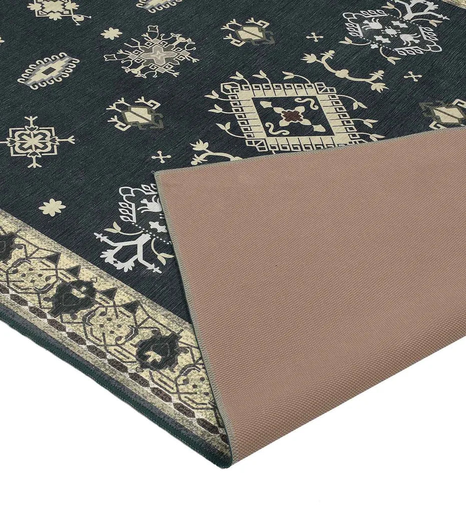 Washable area rug featuring tribal medallion and border.