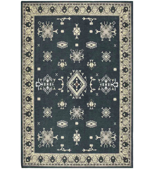 Gray tribal medallion rug with border design.