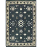 Gray tribal medallion border design rug with intricate geometric patterns on dark background
