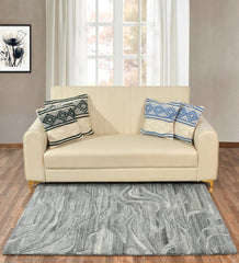 Modern grey rug featuring flowing wave-like textured pattern