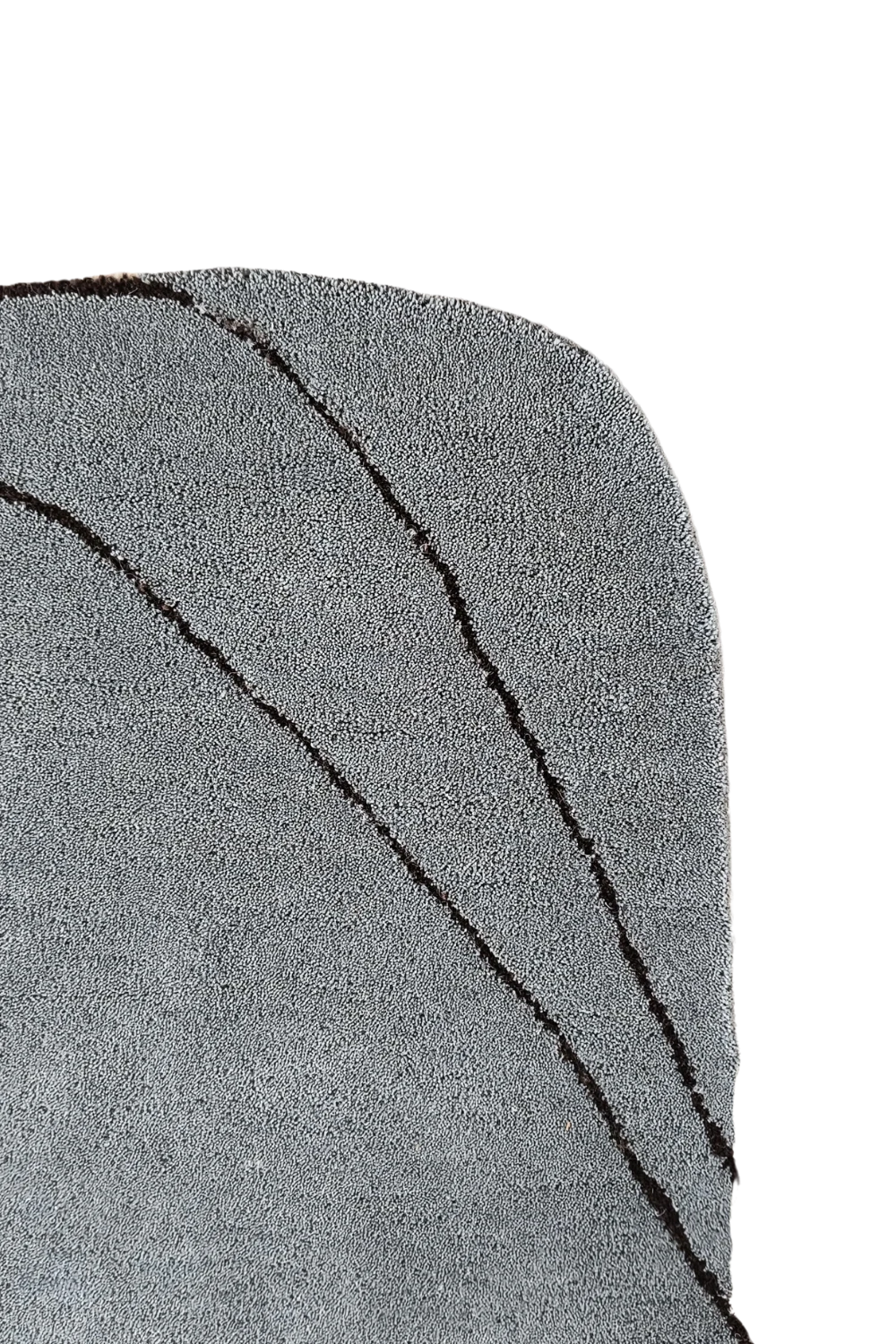 Modern abstract wool rug in neutral grey and warm brown tones.