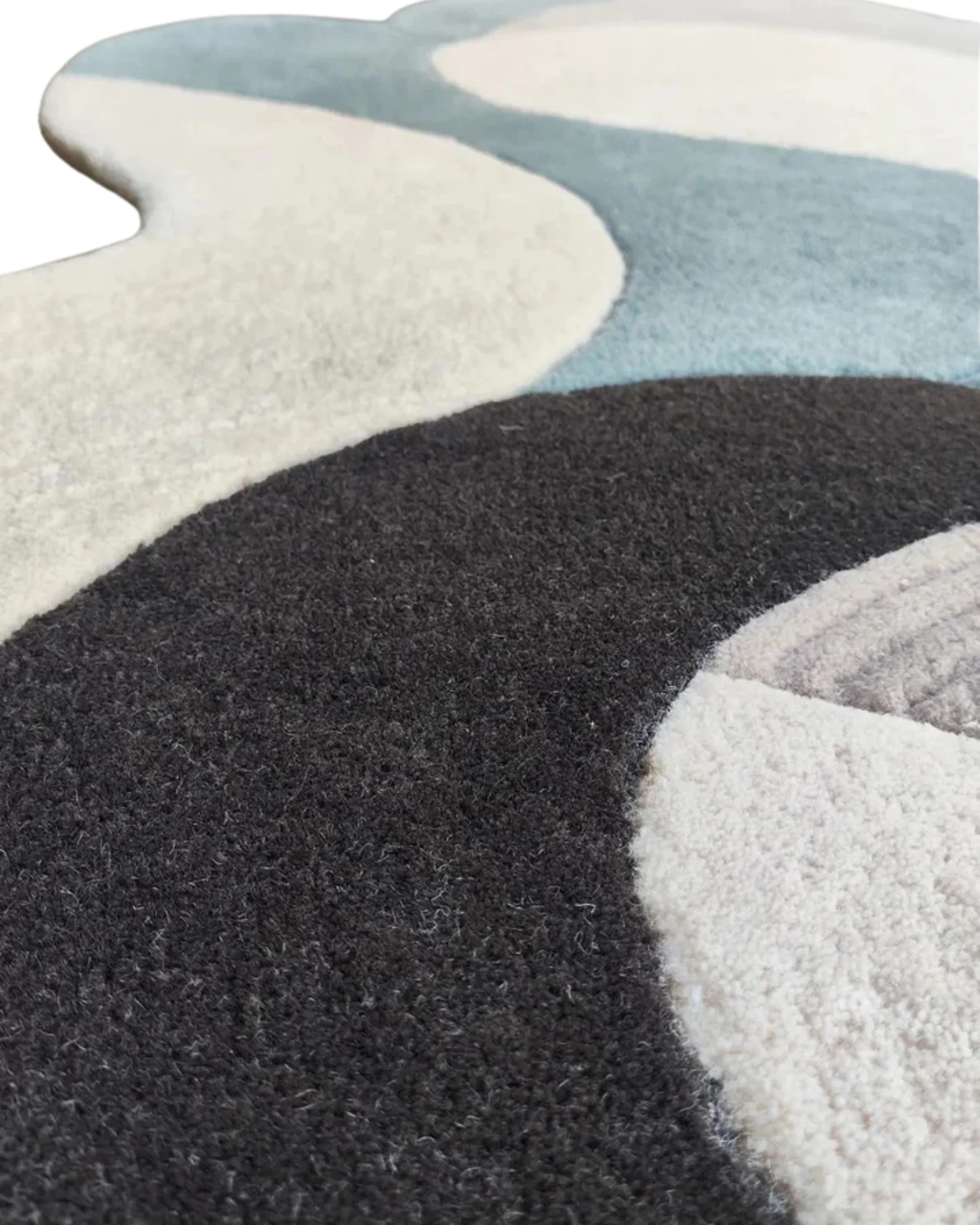 Handcrafted premium wool rug in neutral gray tones.