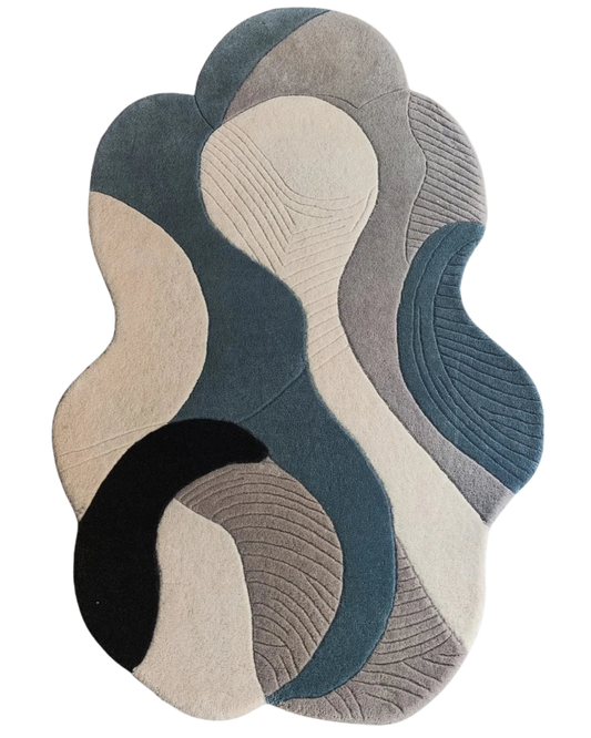 Gray and beige abstract hand-tufted wool area rug.