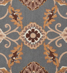 Luxury wool rug with gray background and golden floral motifs