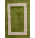 Green hand-tufted wool rug with ivory rectangular border