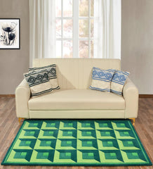 Modern green rug featuring optical illusion cube pattern