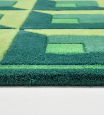Bold geometric green wool rug for modern and eclectic interiors
