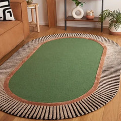 Green oval Stripe Border rug in living room