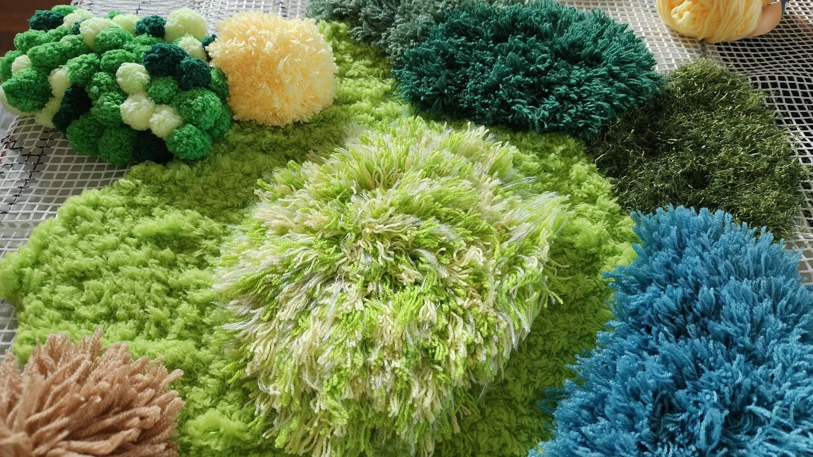 Organic abstract hand-tufted wool rug inspired by natural landscapes and greenery