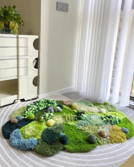 Hand-tufted green abstract wool rug with sculpted high-low texture and organic landscape design