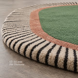 Green oval stripe wool rug