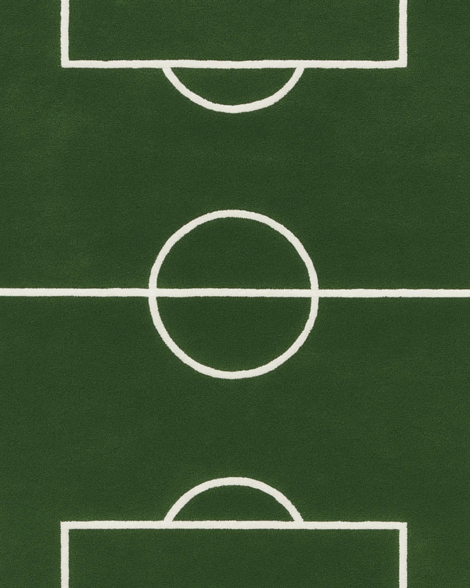 Premium wool soccer field novelty rug in green and white.